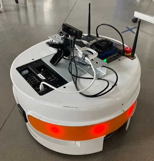 The PAL robotics robot I work on. It's a differential drive base outfitted with an NVIDIA Jetson and OAK-D depth camera.
