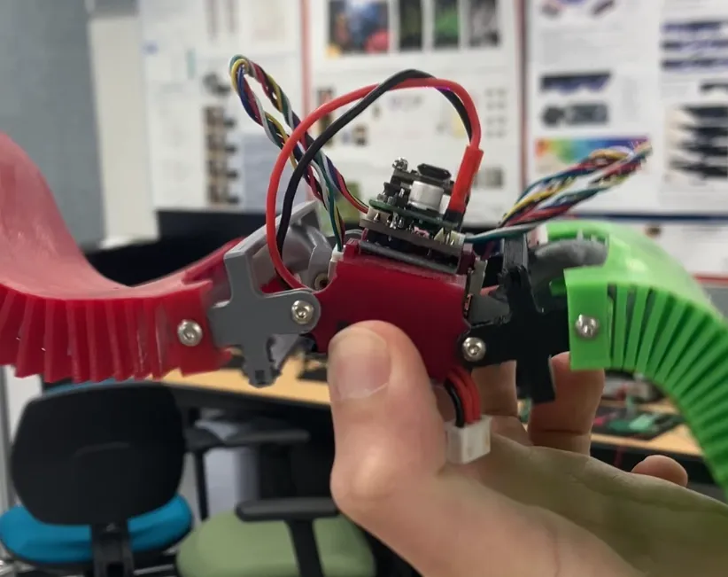 The SAW robot I work on. It has two flexible 3D printed waves that it can move with its motors.
